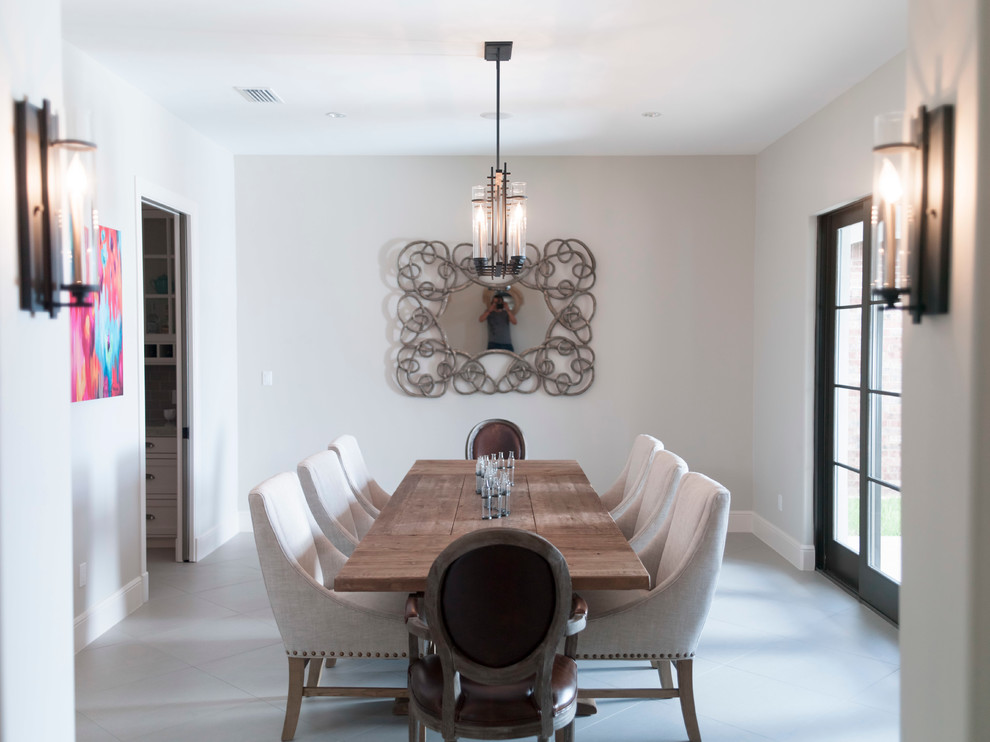 Example of a transitional dining room design in Austin