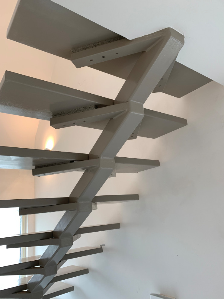 Modernisierung Einfamilienhaus mit Erweiterung der Gauben und  Fensteraufteilung