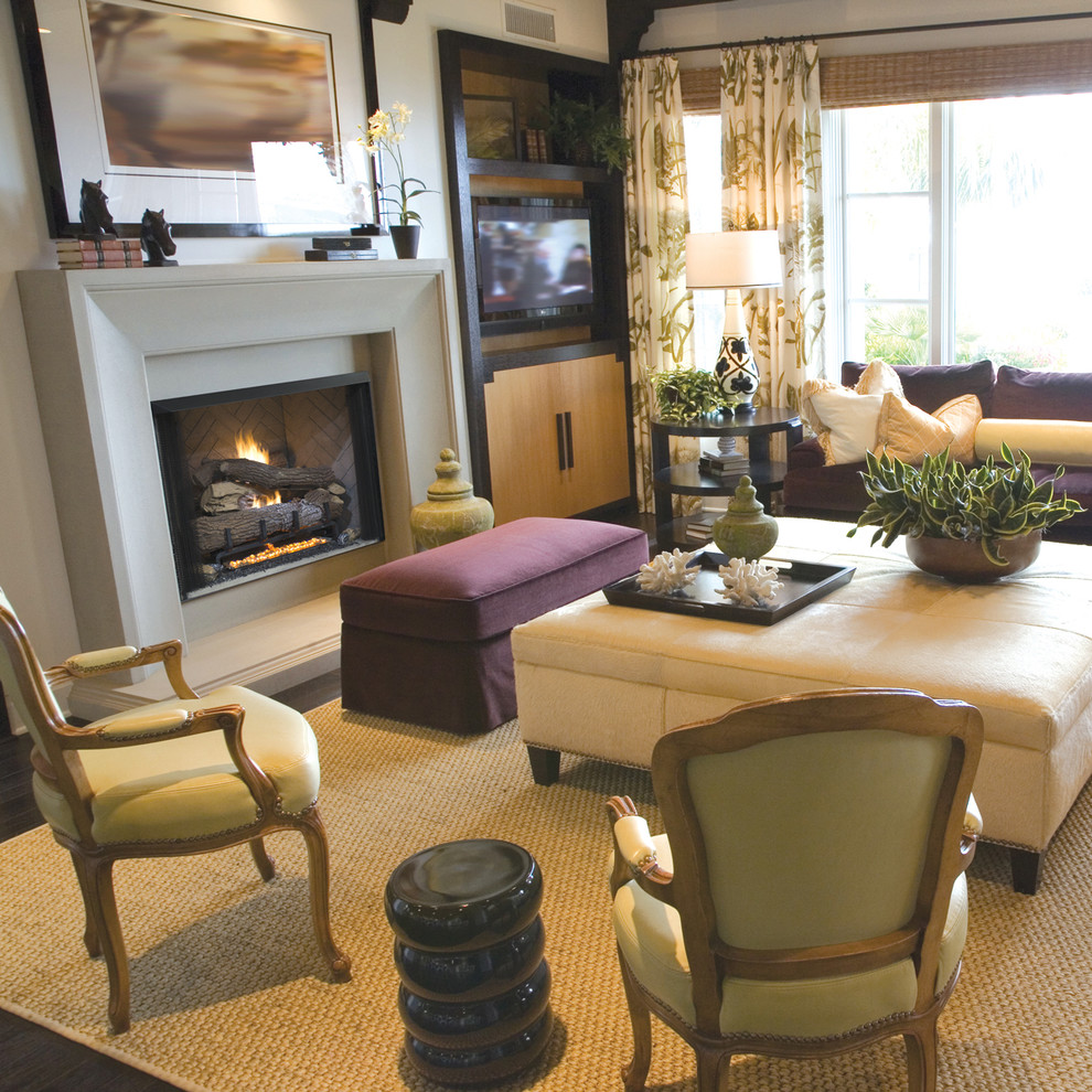 Inspiration for a traditional living room in Orange County with a standard fireplace.