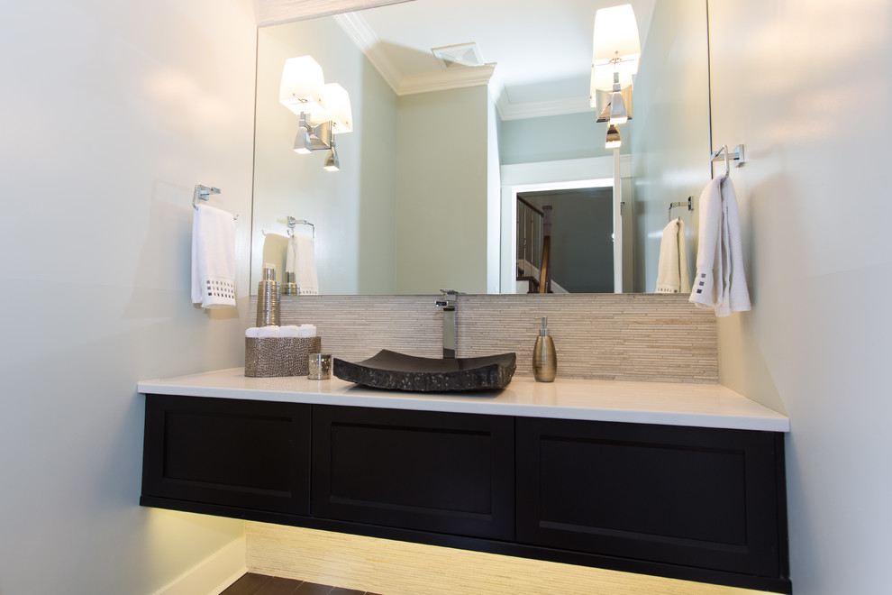 Inspiration for a contemporary 3/4 bathroom in Vancouver with shaker cabinets, dark wood cabinets, beige tile, porcelain tile, blue walls, dark hardwood floors, a vessel sink and engineered quartz benchtops.