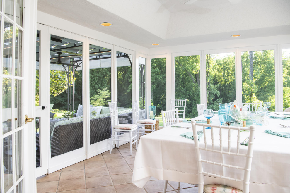 This is an example of a transitional sunroom in Baltimore with a standard ceiling and beige floor.