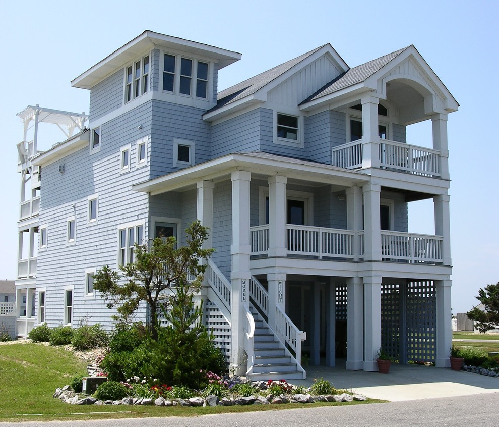 Design ideas for a mid-sized beach style exterior in Wilmington.