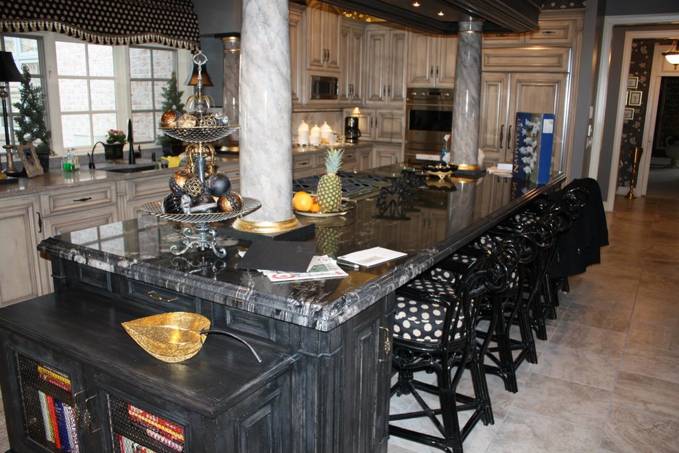 Photo of an eclectic kitchen in St Louis with with island and granite benchtops.