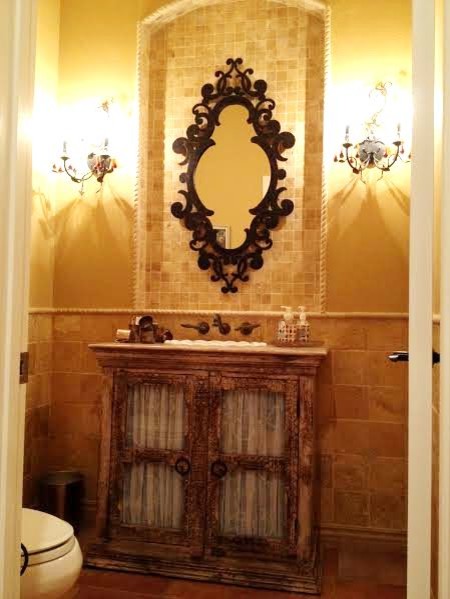 Design ideas for a mid-sized traditional powder room in San Diego.