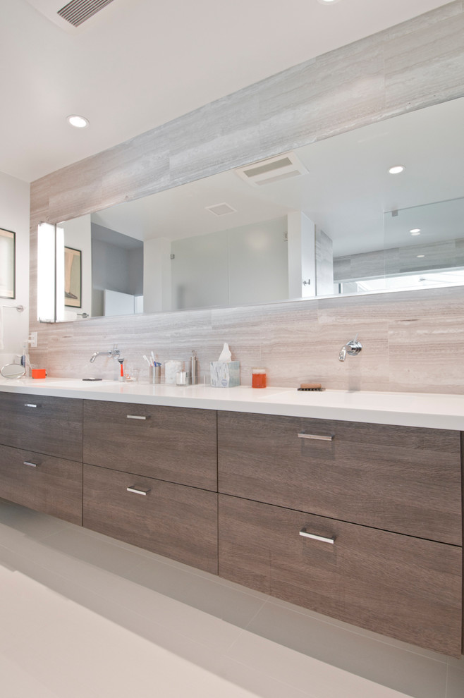 Design ideas for a large modern master bathroom in Los Angeles with flat-panel cabinets, brown cabinets, an open shower, gray tile, limestone, white walls, porcelain floors, an undermount sink, beige floor and an open shower.