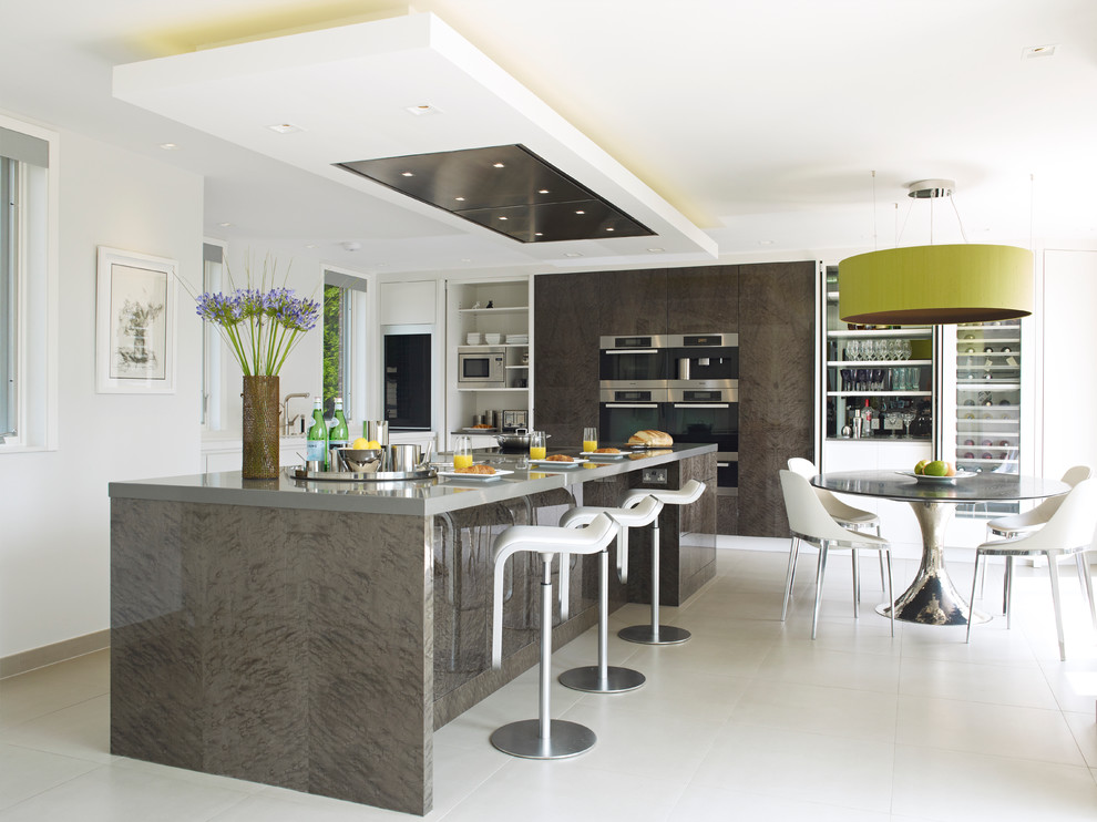 This is an example of a contemporary l-shaped eat-in kitchen in Other with open cabinets, white cabinets, stainless steel appliances and with island.
