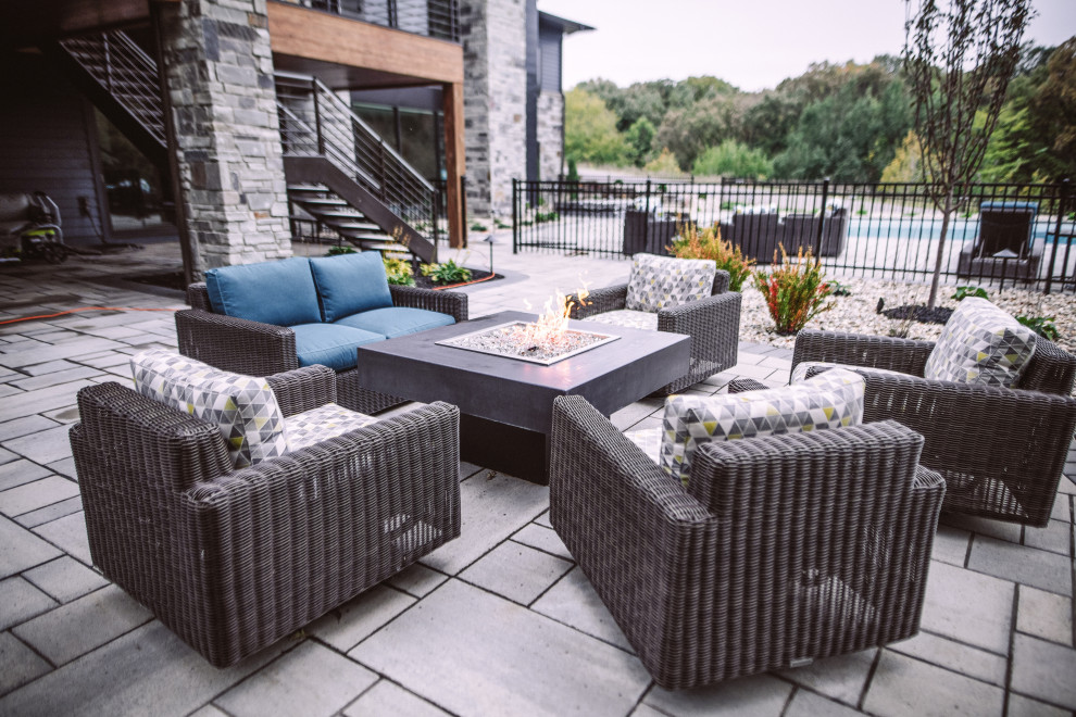 Hot tub - large transitional backyard concrete paver and rectangular hot tub idea