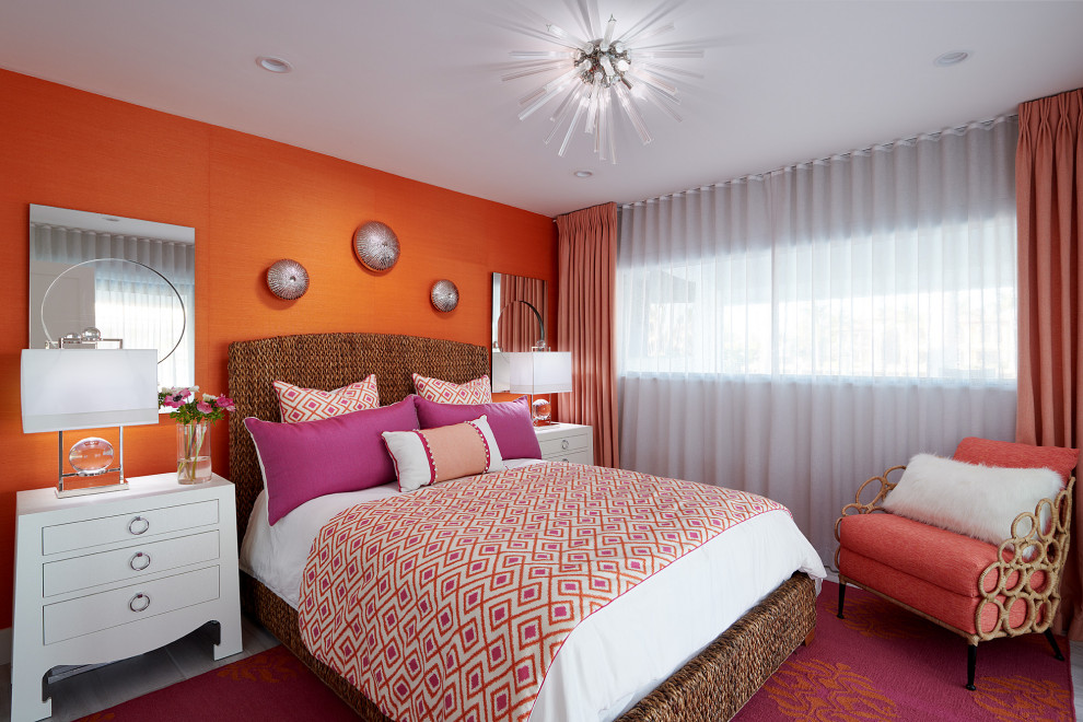Design ideas for a small contemporary guest bedroom in Miami with orange walls, porcelain floors, no fireplace and grey floor.