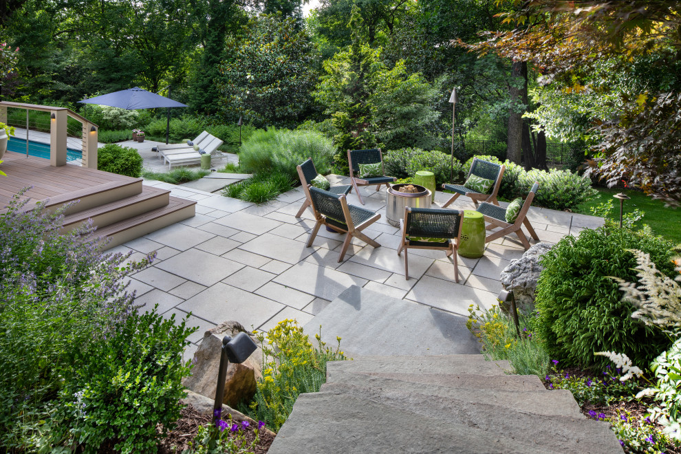 Patio - transitional backyard patio idea in DC Metro with a fire pit
