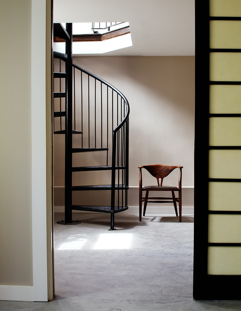Small contemporary metal spiral staircase in San Francisco with metal risers.