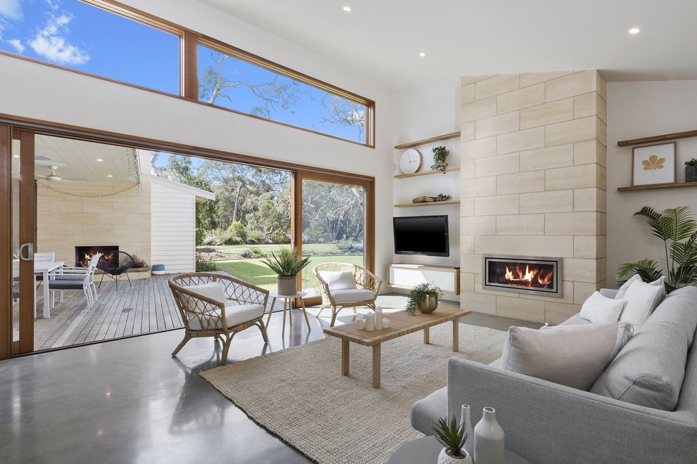 This is an example of a beach style living room in Geelong.