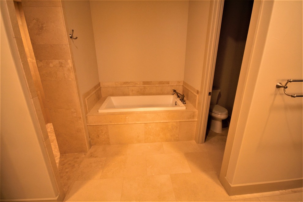 Design ideas for a large traditional master bathroom in Austin with raised-panel cabinets, grey cabinets, an alcove tub, an open shower, a one-piece toilet, beige tile, ceramic tile, beige walls, ceramic floors, an undermount sink, granite benchtops, beige floor, an open shower and multi-coloured benchtops.
