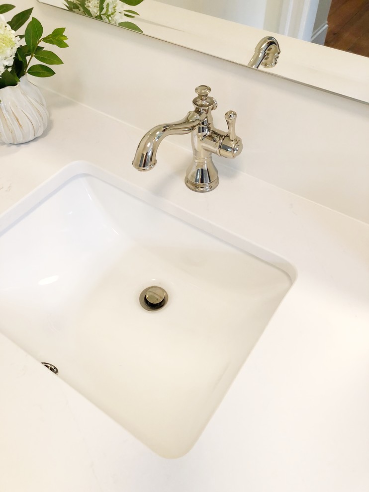 Small transitional master gray tile and marble tile marble floor and gray floor alcove shower photo in Providence with furniture-like cabinets, white cabinets, white walls, an undermount sink, marble countertops and white countertops
