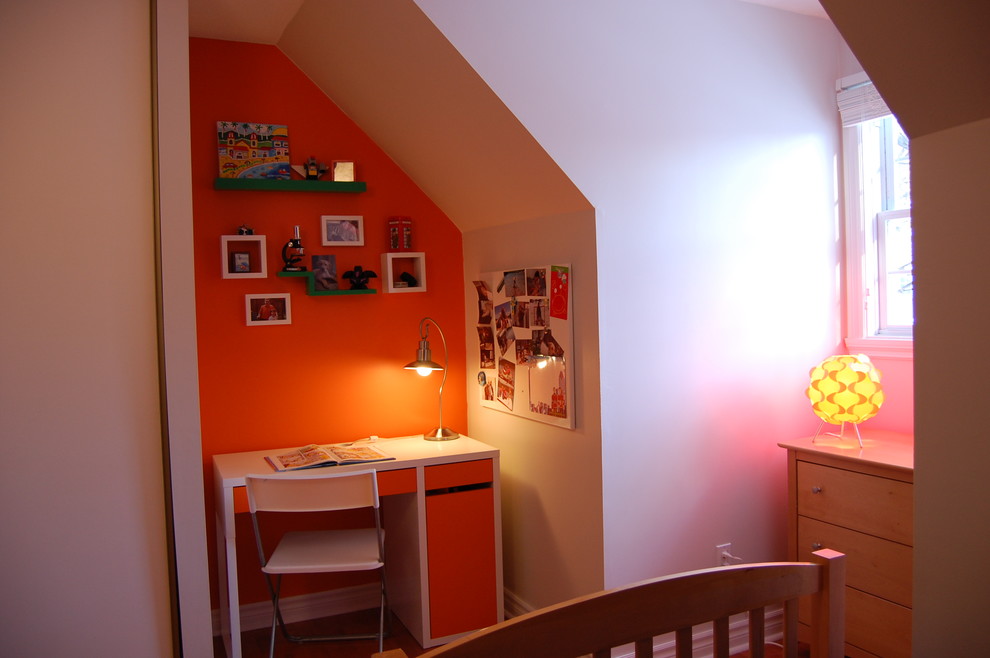 Trendy bedroom photo in Montreal with orange walls