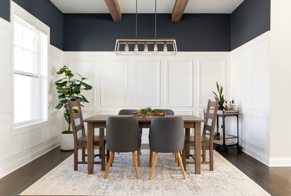 Design ideas for a mid-sized transitional separate dining room in Minneapolis with white walls, dark hardwood floors, no fireplace, brown floor, exposed beam and decorative wall panelling.