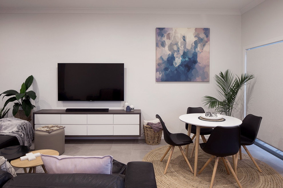 This is an example of a large contemporary open plan dining in Sydney with white walls and ceramic floors.