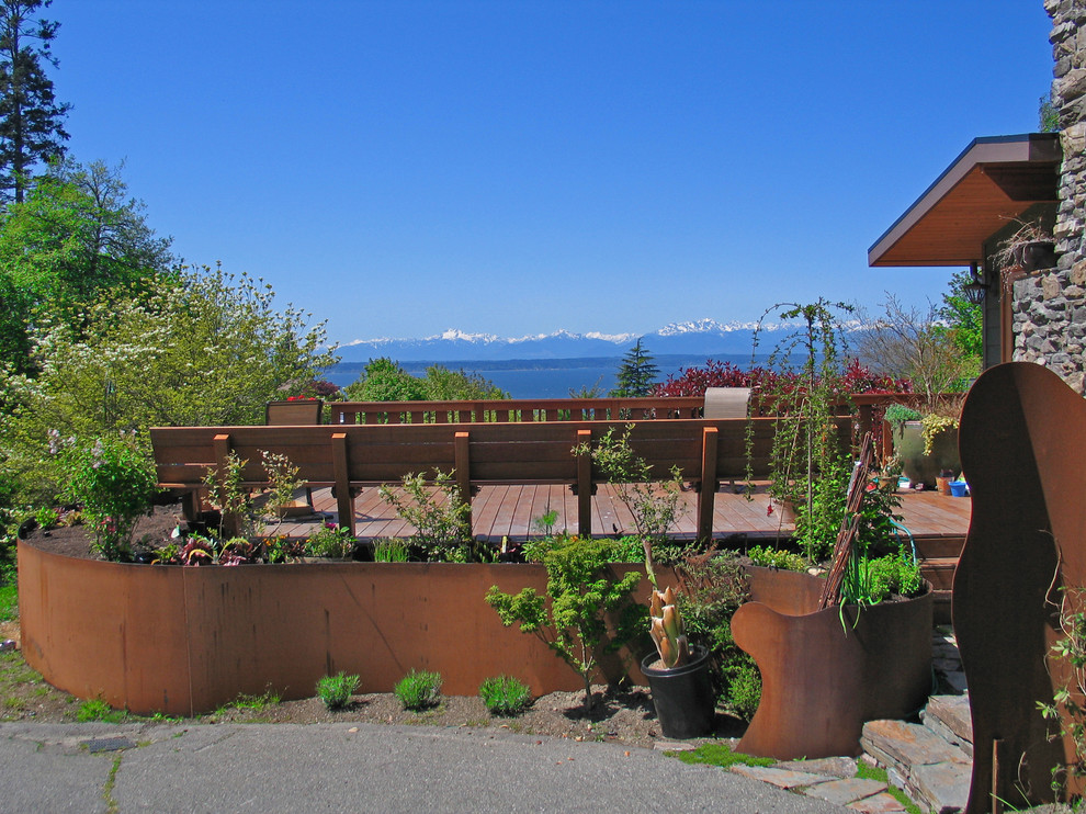Design ideas for a country deck in Seattle with no cover.