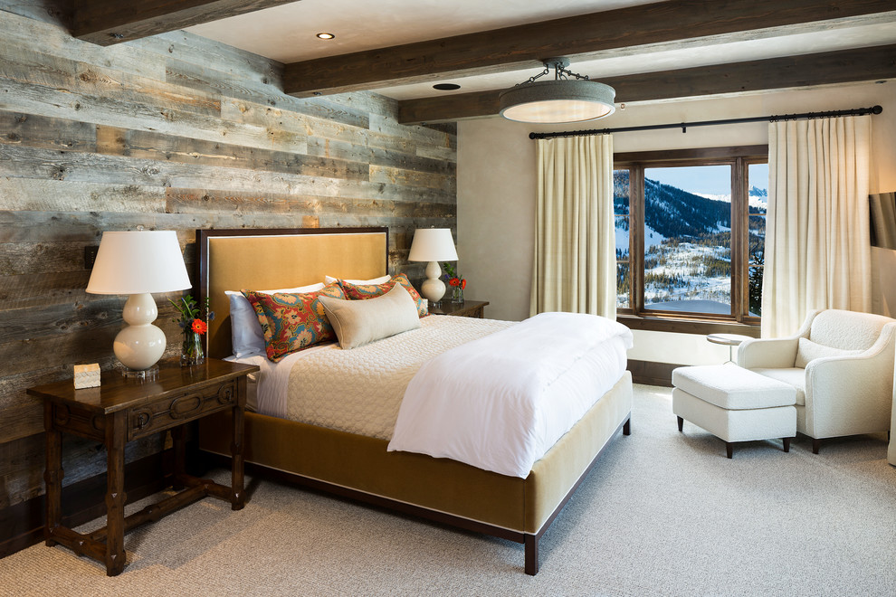 Inspiration for a country master bedroom in Other with beige walls and carpet.