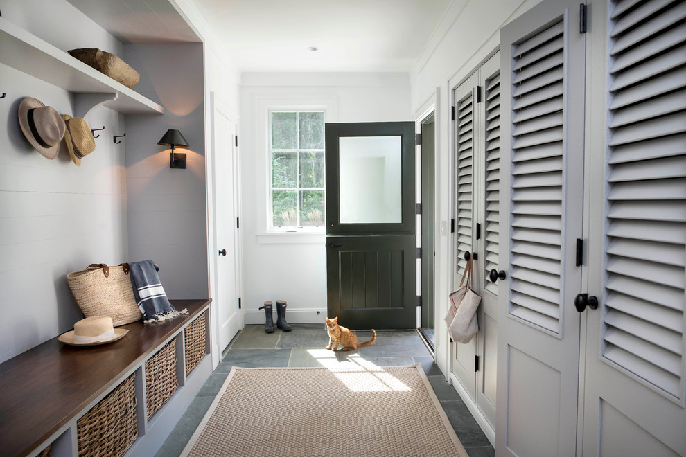 Transitional mudroom in Raleigh with white walls, slate floors, a dutch front door and a black front door.