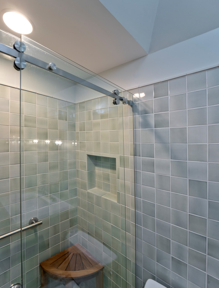 This is an example of a mid-sized midcentury master bathroom in DC Metro with flat-panel cabinets, medium wood cabinets, an alcove shower, a two-piece toilet, green tile, ceramic tile, green walls, mosaic tile floors, an undermount sink, engineered quartz benchtops, white floor, a sliding shower screen, white benchtops, a niche, a single vanity, a floating vanity, vaulted and decorative wall panelling.