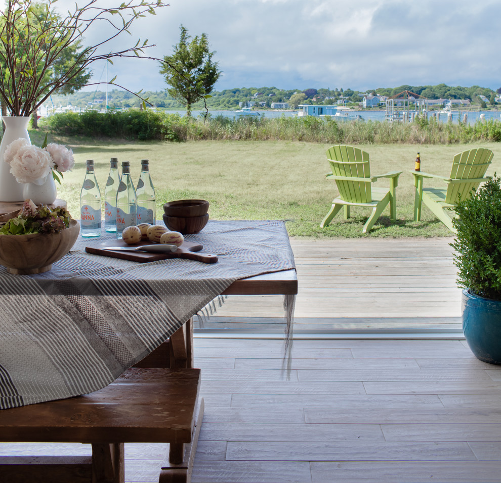 Example of a beach style home design design in Providence