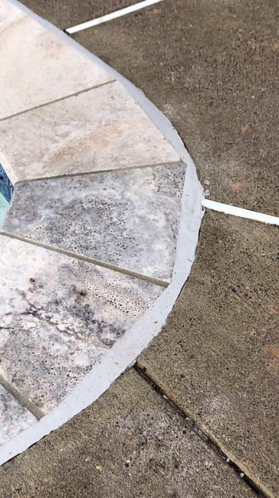 Pool coping / travertine cuts and grout lines
