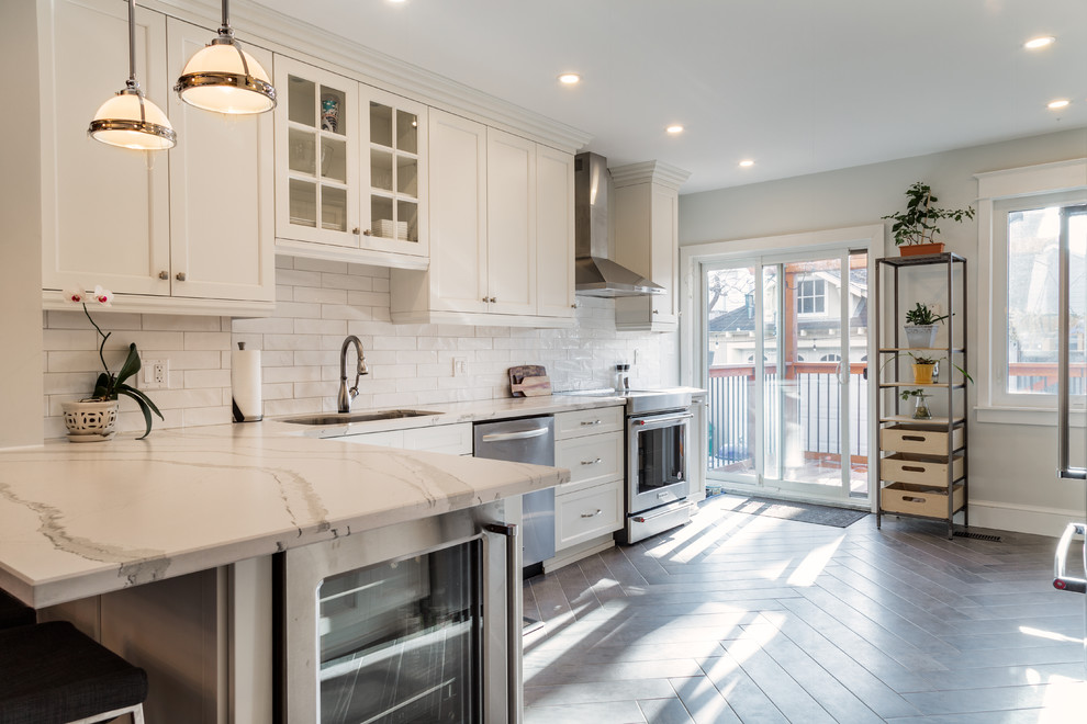 Example of a transitional home design design in Toronto