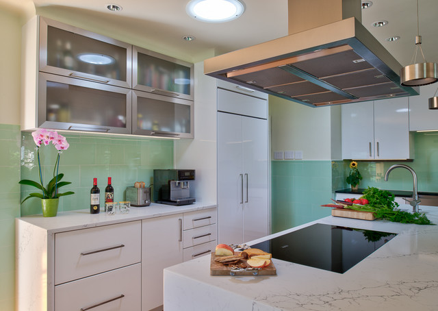 Marble Waterfall Counters And A Floating Range Hood Contemporary