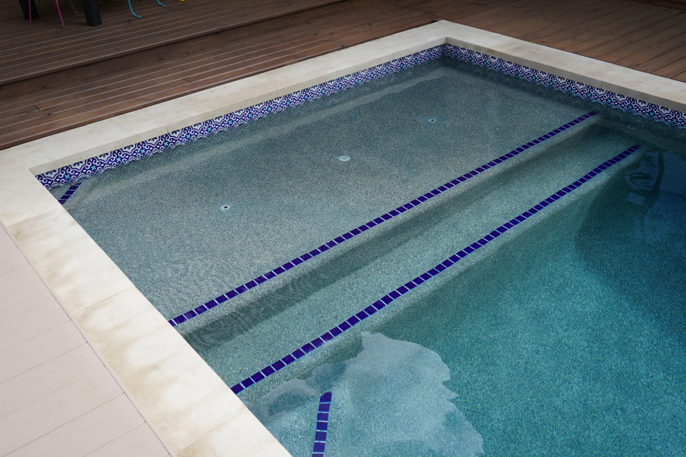 Small side yard pool photo in Austin