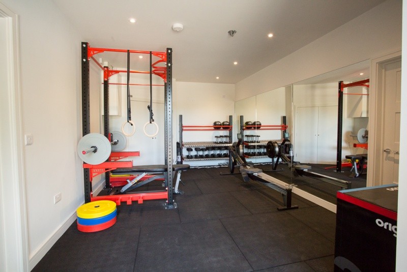Photo of a modern home gym in Sussex.