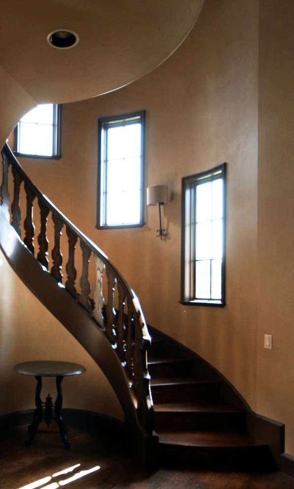 This is an example of a large traditional staircase in Dallas.