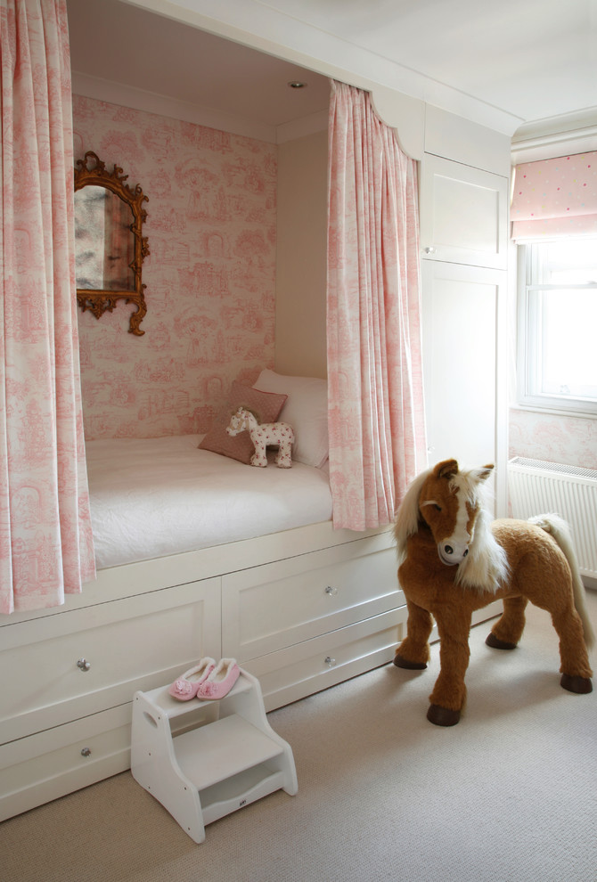 Design ideas for a traditional kids' bedroom for kids 4-10 years old and girls in London with carpet and multi-coloured walls.