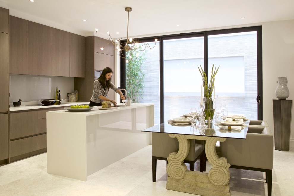 Inspiration for a mid-sized contemporary single-wall eat-in kitchen in London with flat-panel cabinets, glass sheet splashback, with island and white floor.