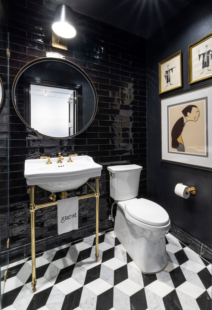 Inspiration for a contemporary 3/4 black tile and ceramic tile marble floor, multicolored floor and single-sink bathroom remodel in Dallas with a two-piece toilet, black walls, a pedestal sink and a freestanding vanity