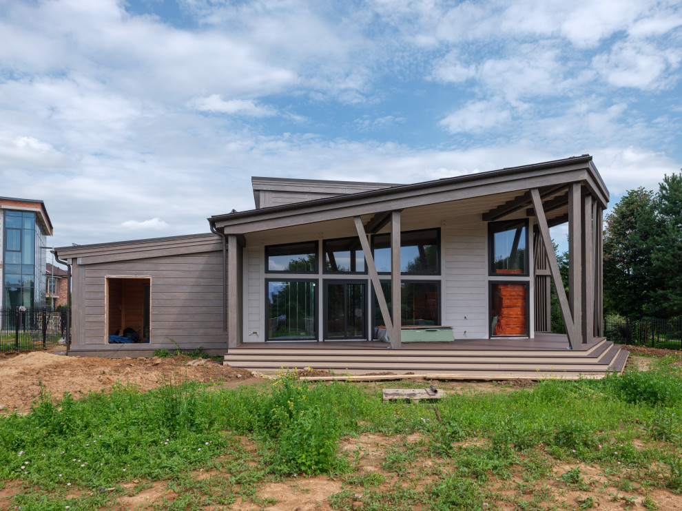 Трапецевидные окна, порталы и входные двери для современного дома