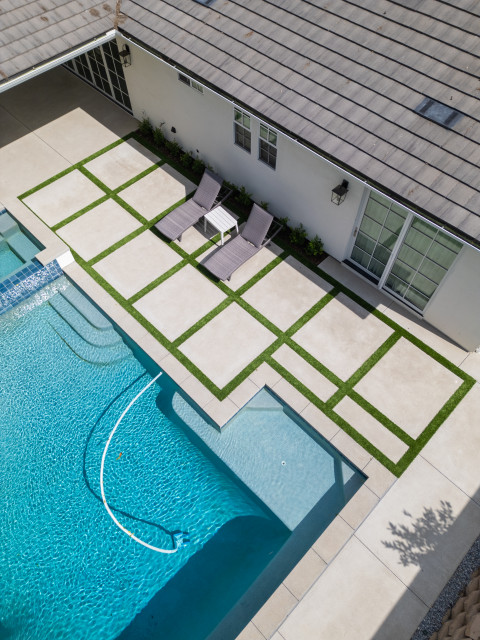 Modern Poolside Lounge with Grid Patio transitional-swimming-pool