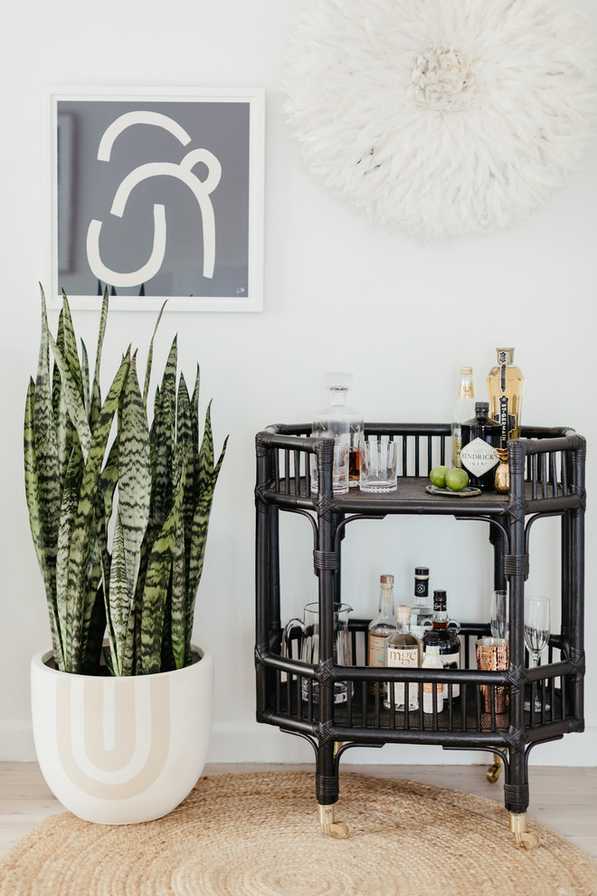 Inspiration for a beach style bar cart in Sydney with light hardwood floors and beige floor.
