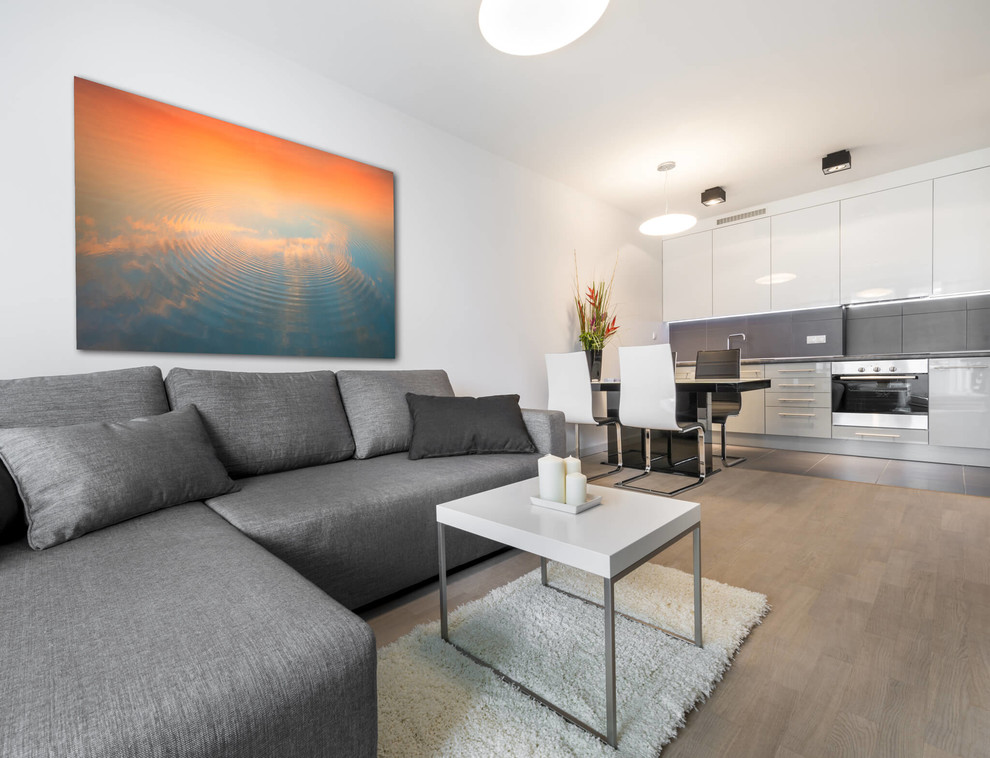 Inspiration for a mid-sized scandinavian light wood floor kitchen/dining room combo remodel in Miami with white walls