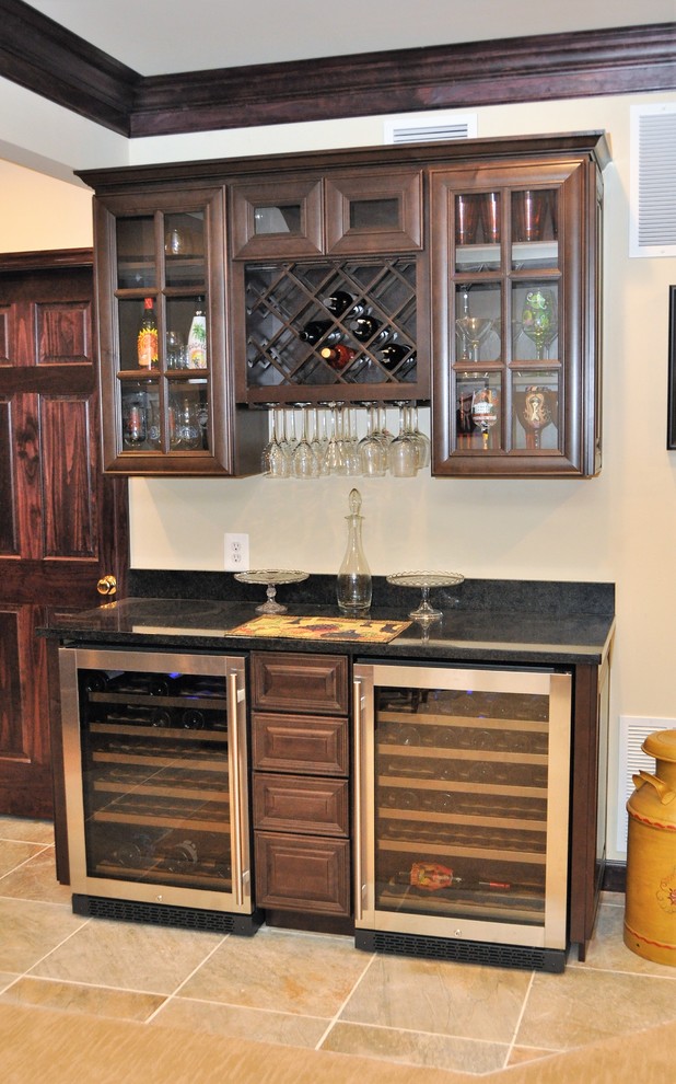 Inspiration for a large contemporary wet bar in DC Metro with dark wood cabinets, granite benchtops and ceramic floors.