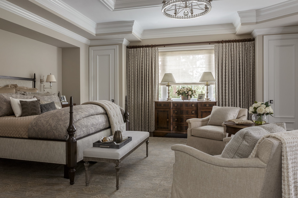 This is an example of a large traditional master bedroom in San Francisco with beige walls.