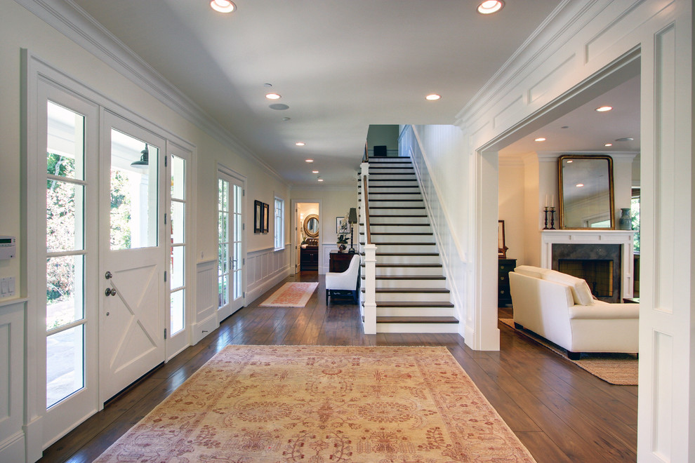 Design ideas for a traditional entryway in Los Angeles with white walls.