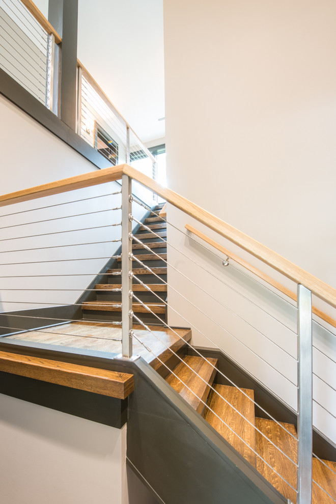 Staircase - large transitional wooden u-shaped open staircase idea