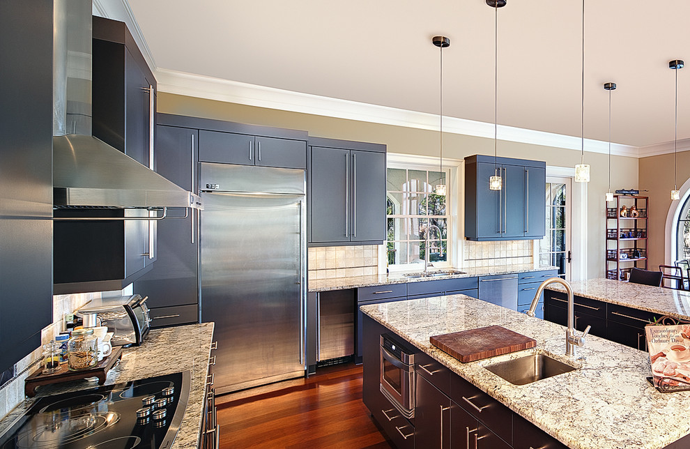Photo of a contemporary kitchen in Charleston with stainless steel appliances and granite benchtops.