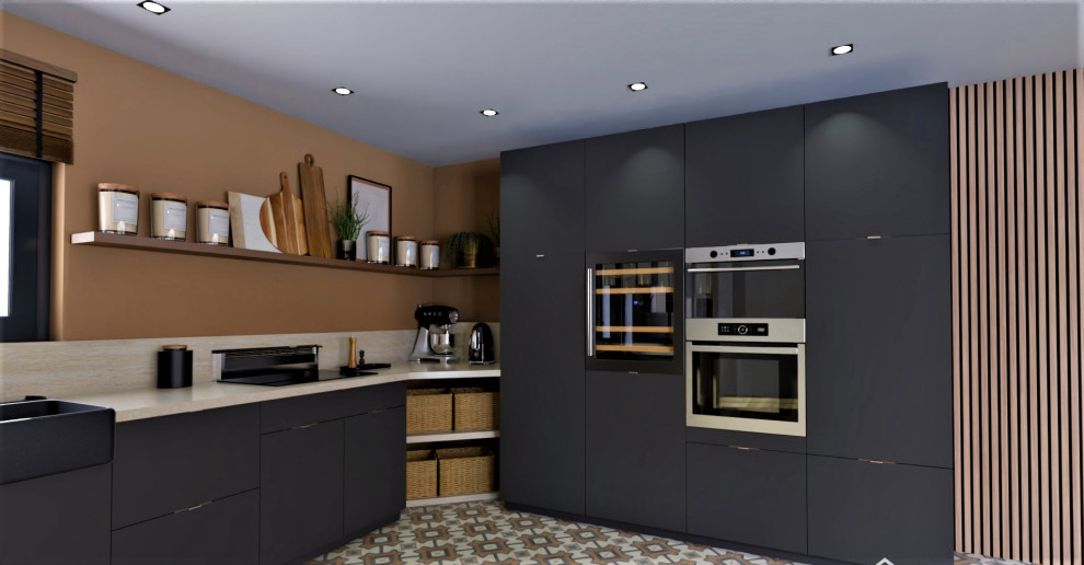 Modelo de cocinas en U retro grande abierto con armarios con paneles lisos, puertas de armario negras, encimera de cuarcita y encimeras beige