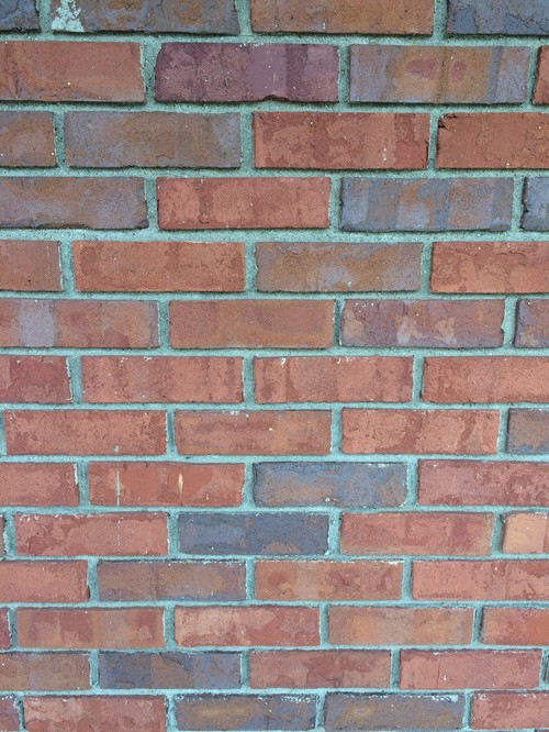 Paint color help for 1970's orange brick ranch