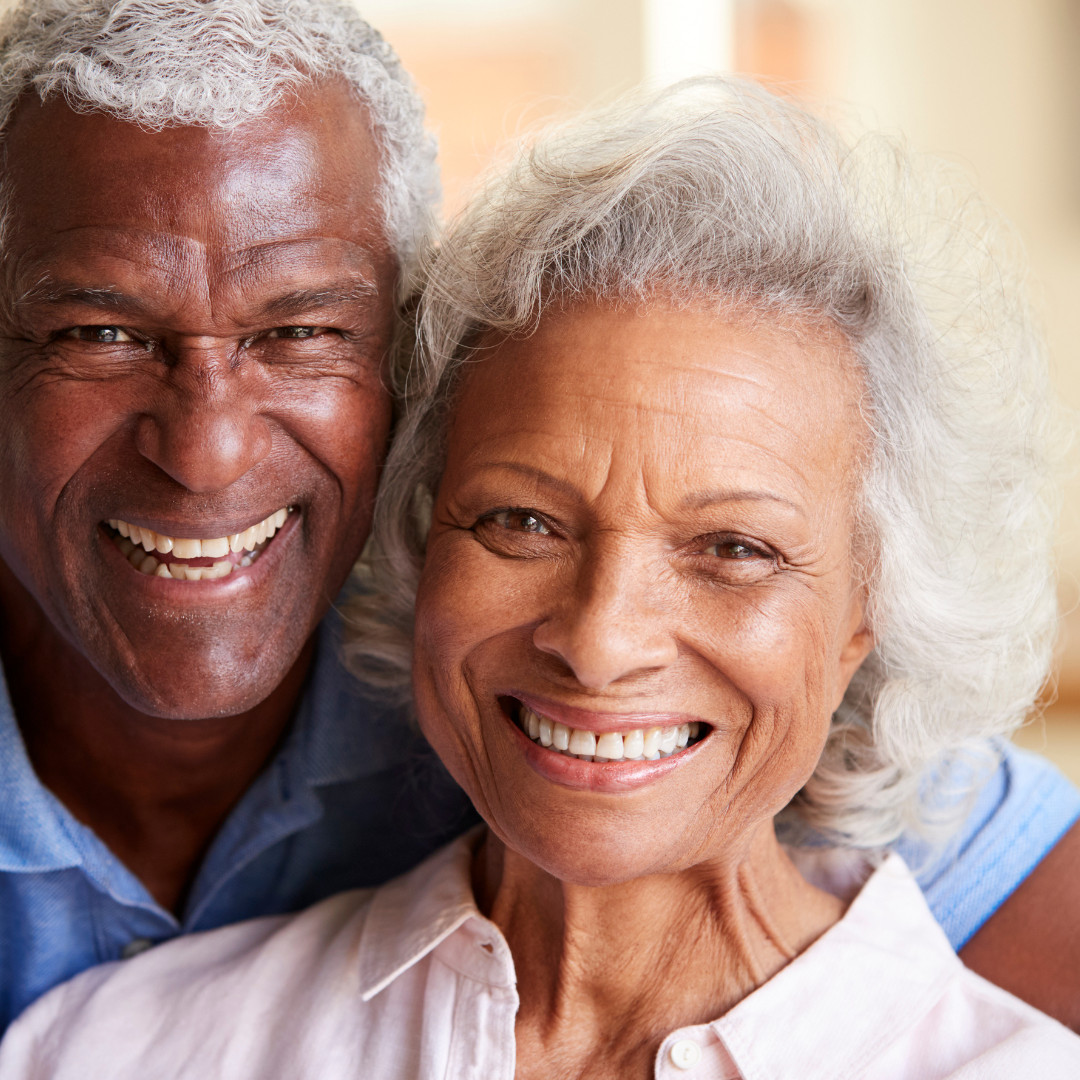 smiling elderly couple