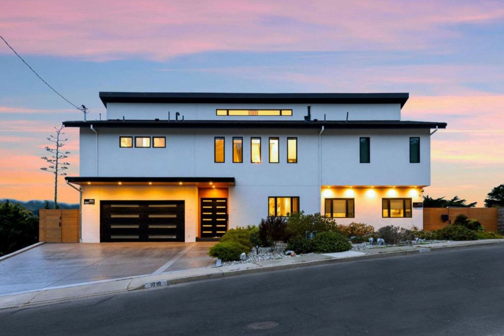 Modern Multi-Level Home Exterior at Sunset | Pacifica