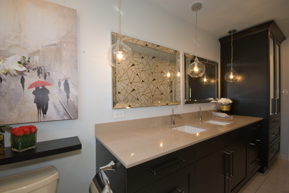 Alcove bathtub - mid-sized transitional double-sink alcove bathtub idea with recessed-panel cabinets, black cabinets, an undermount sink, quartz countertops, a hinged shower door, beige countertops and a built-in vanity