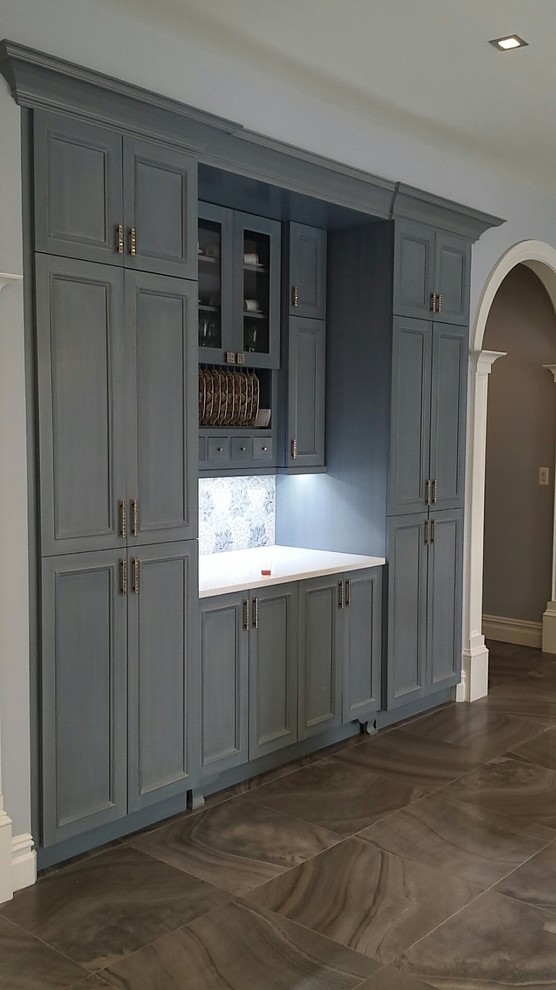 Kitchen - transitional kitchen idea in New York with recessed-panel cabinets and gray cabinets