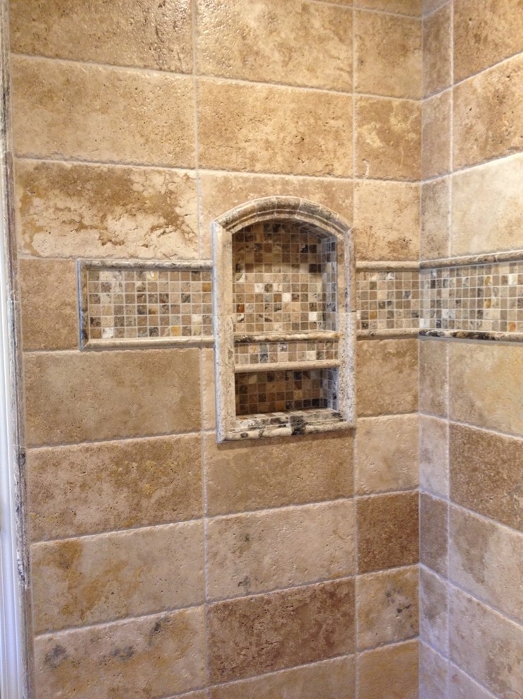 Doorless shower - multicolored tile and stone tile doorless shower idea